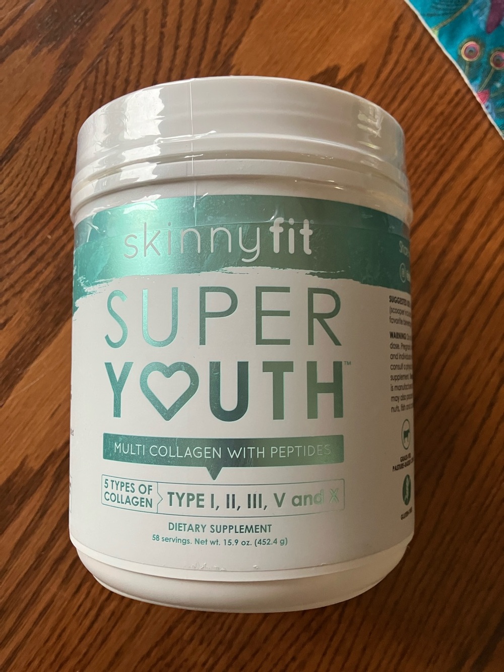 SkinnyFit Super Youth Multi-Collagen Powder in Teal and White